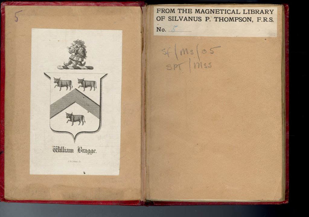 Inside cover of bound manuscript, with bookplate on left and library label on right