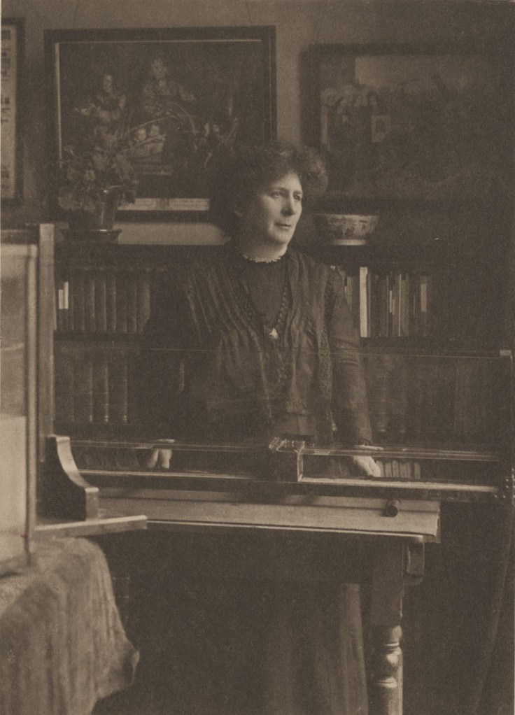 Hertha Ayrton standing in her laboratory