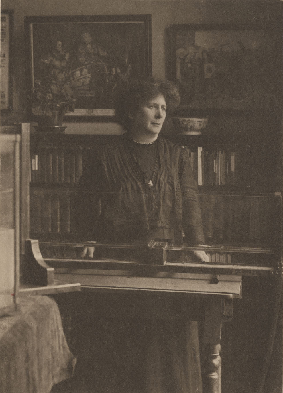 Hertha Ayrton standing in her laboratory