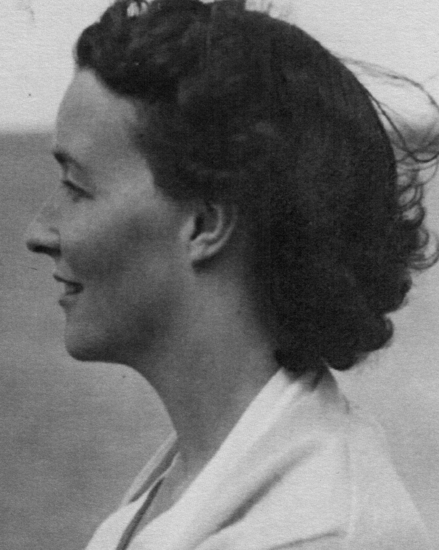 Head and shoulders photograph of woman in profile